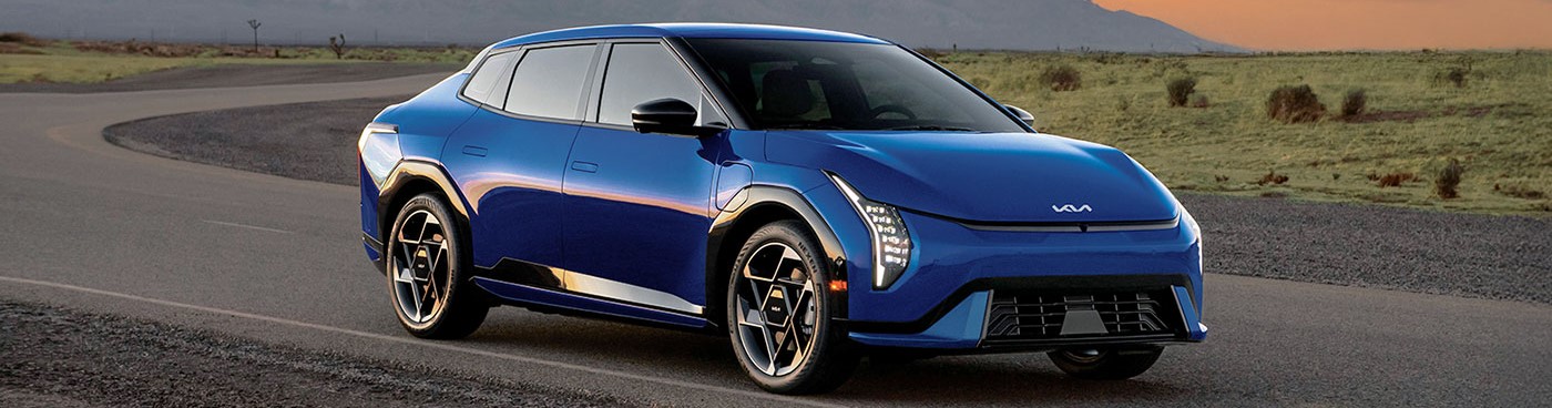 2026 Kia EV4 driving down road